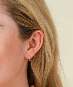 Astrid & Miyu Wave Crystal Huggies In Gold