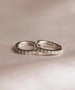 Astridandmiyu April Birthstone Huggies In Silver With Clear CZ