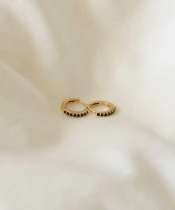 Astrid & Miyu Black Crystal Huggies In Gold