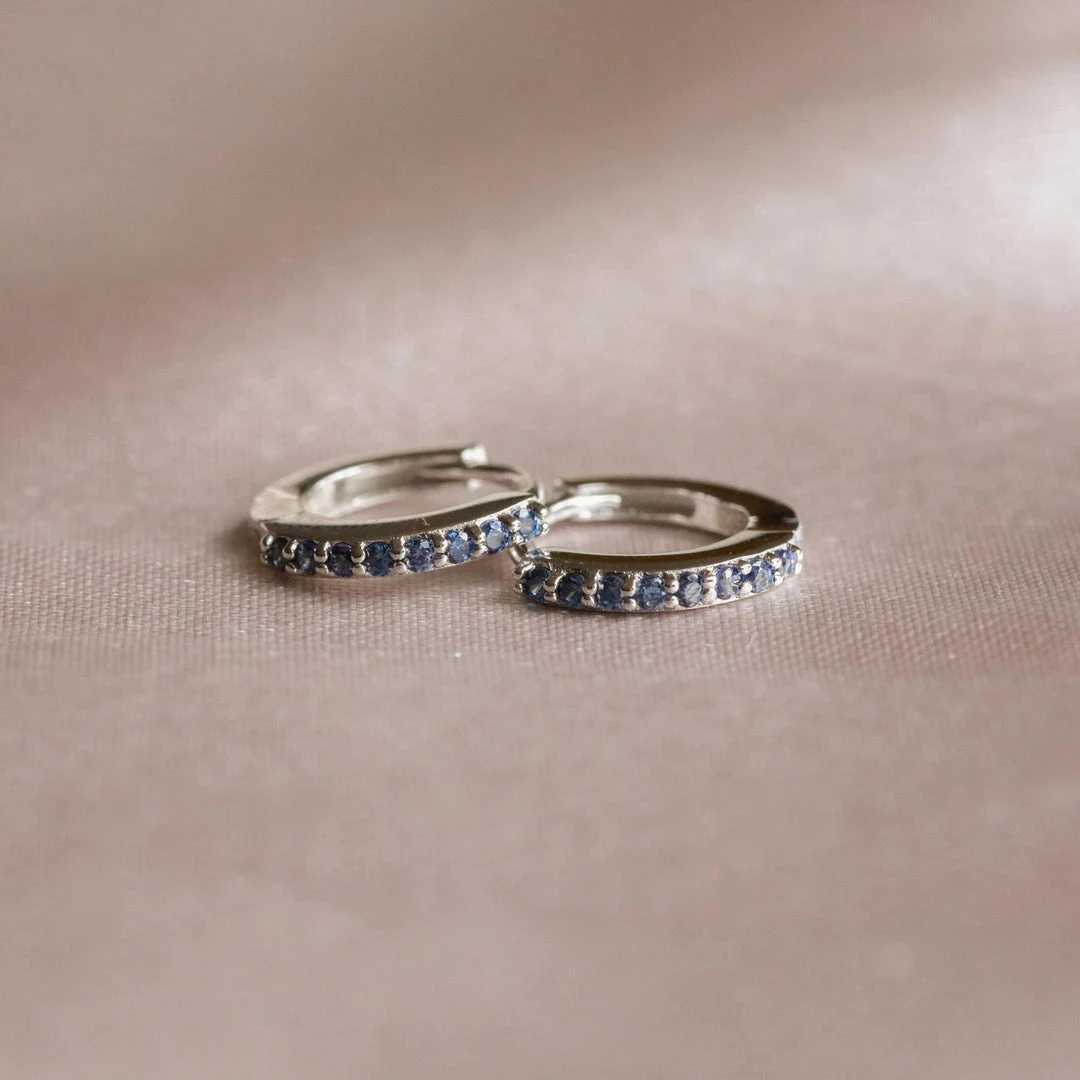 Astrid & Miyu December Birthstone Huggies In Silver With Tanzanite CZ 5 Astrid & Miyu December Birthstone Huggies In Silver With Tanzanite CZ