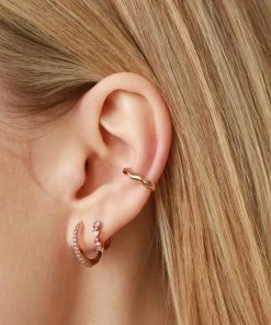 Astrid & Miyu Trilliant Crystal Huggies In Rose Gold 7 Astrid & Miyu Trilliant Crystal Huggies In Rose Gold