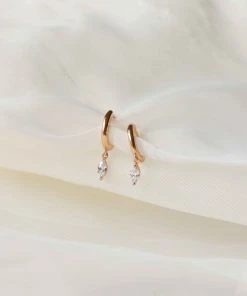 Astrid & Miyu Best Sellers Navette Charm Huggies In Gold 7 Astrid & Miyu Best Sellers Navette Charm Huggies In Gold