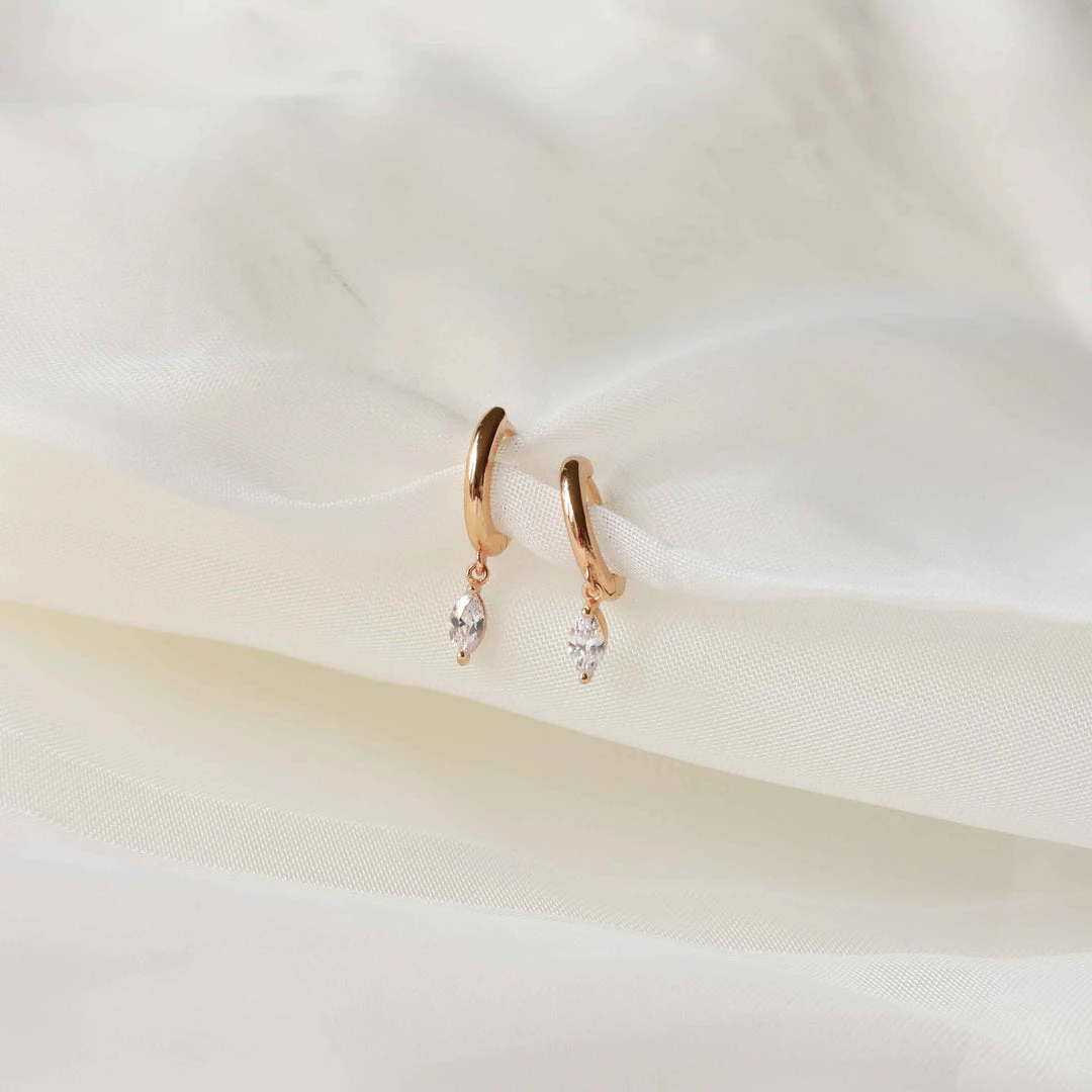 Astrid & Miyu Best Sellers Navette Charm Huggies In Gold 5 Astrid & Miyu Best Sellers Navette Charm Huggies In Gold