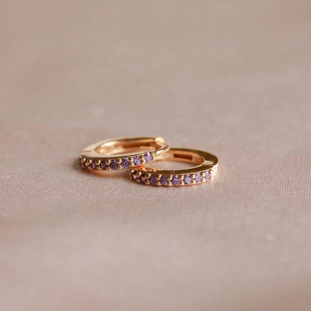 Astrid & Miyu February Birthstone Huggies In Gold With Amethyst CZ 5 Astrid & Miyu February Birthstone Huggies In Gold With Amethyst CZ