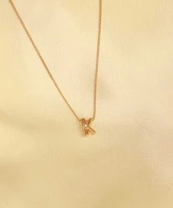 Astrid & Miyu K Initial Pendant Necklace In Gold With K