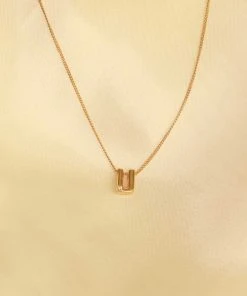 Astrid & Miyu U Initial Pendant Necklace In Gold With U