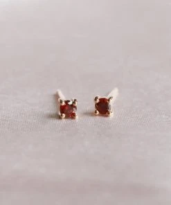 Astrid & Miyu January Birthstone Stud Earrings In Gold With Garnet CZ