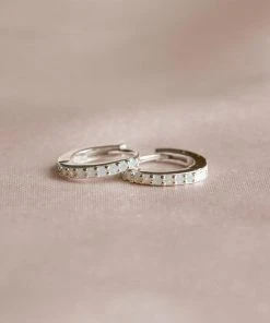 Astrid & Miyu June Birthstone Huggies In Silver With Moonstone CZ Birthstone Earrings