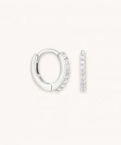 Astrid & Miyu June Birthstone Huggies In Silver With Moonstone CZ Birthstone Earrings