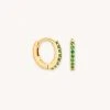 Astridandmiyu Best Sellers May Birthstone Huggies In Gold With Emerald CZ