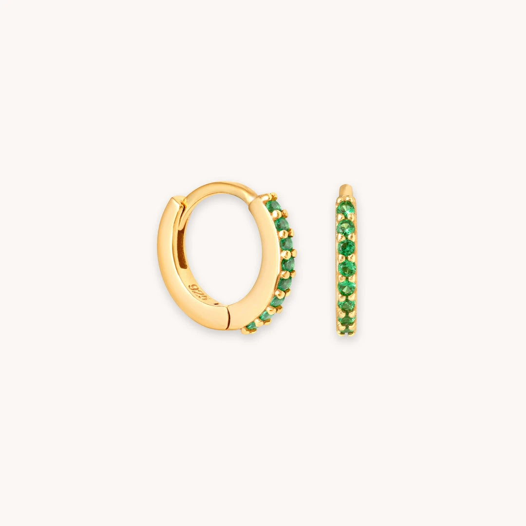 Astridandmiyu Best Sellers May Birthstone Huggies In Gold With Emerald CZ 3 Astridandmiyu Best Sellers May Birthstone Huggies In Gold With Emerald CZ