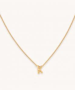 Astrid & Miyu K Initial Pendant Necklace In Gold With K