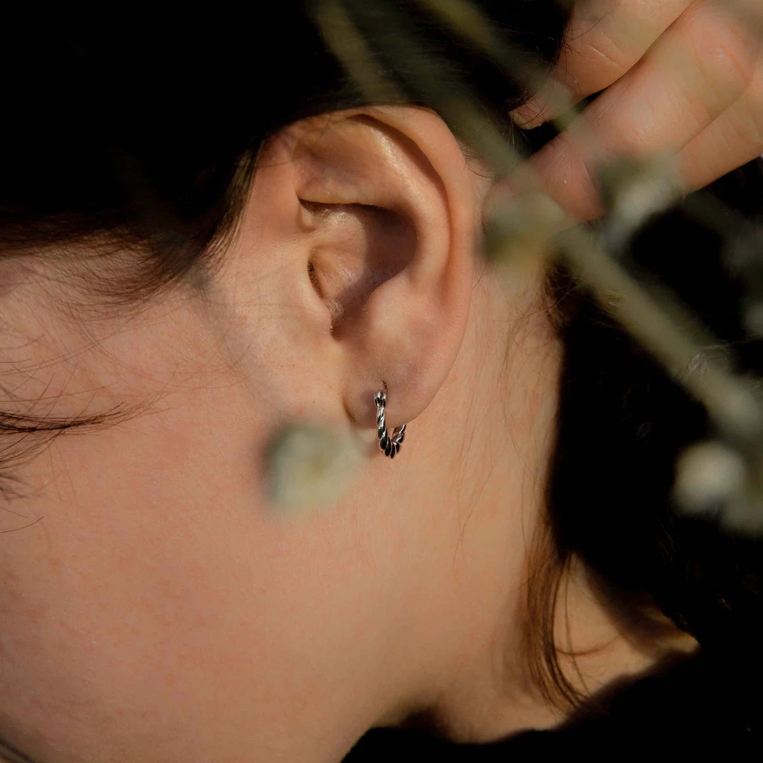 Astrid & Miyu Twisted Mini Hoops In Silver 5 Astrid & Miyu Twisted Mini Hoops In Silver