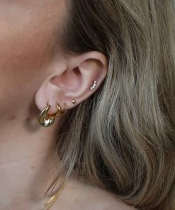 Astridandmiyu Molten Small Stud Earrings In Gold